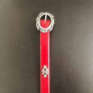 Elegant Red Leather Belt with Ornate Silver Buckle